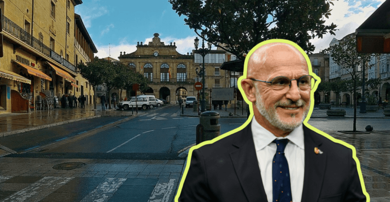 A man in a suit with glasses stands in a European town square a bright yellow outline marks a cutout overlay