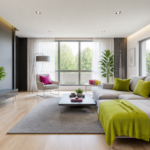 Modern living room with a gray sectional sofa, lime-green pillows, and a lime blanket draped over the chaise facing a low coffee table.