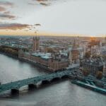 Aerial view of the Thames at Westminster with the Houses of Parliament and Westminster Bridge at sunset