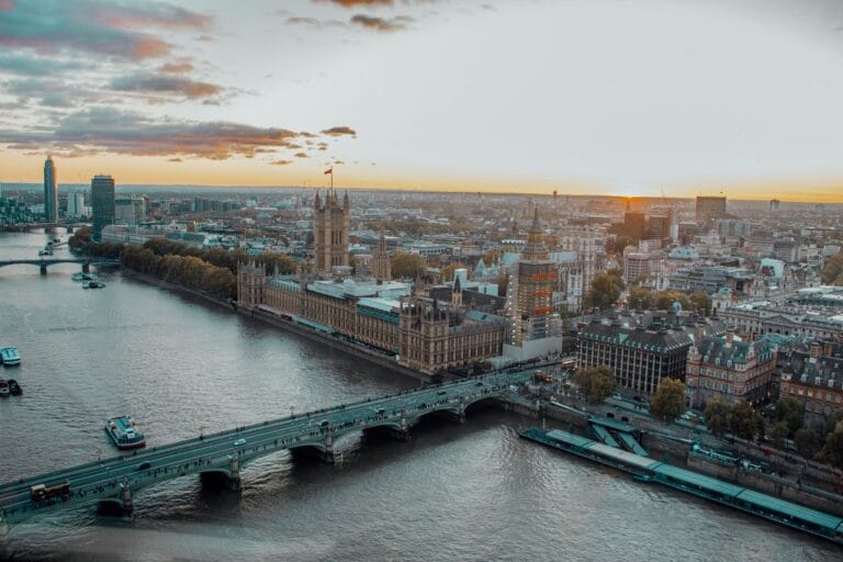 Aerial view of the Thames at Westminster with the Houses of Parliament and Westminster Bridge at sunset